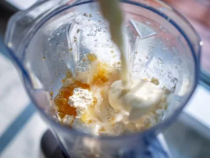 Blending cottage cheese and fruit for ice cream