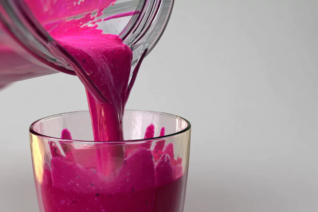 pouring pitaya fruit juice