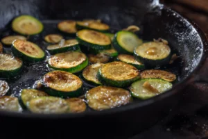 Sauteed Zucchini Recipe in Cast Iron Skillet with Caramelized Edges