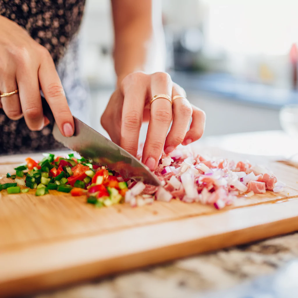 Chopping ingredients for Italian chopped sandwich