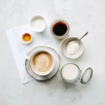 Printable recipe card layout with low FODMAP coffee creamer ingredients and a cup of coffee