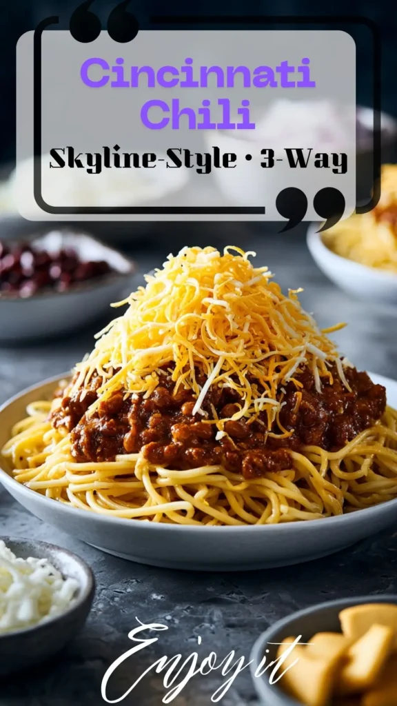Cincinnati chili over spaghetti with a mound of finely shredded cheddar—classic 3-Way, Skyline copycat look, glossy pourable sauce.