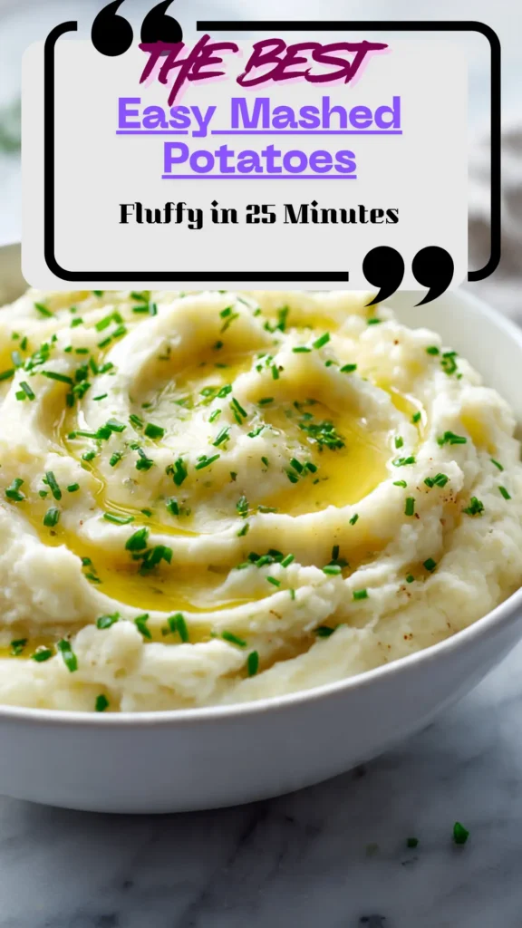 Overhead bowl of fluffy mashed potatoes with melted butter puddles and chives; smooth riced texture; classic weeknight side.