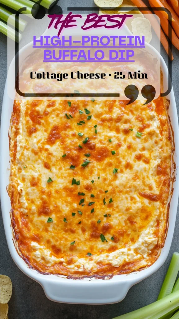 Overhead dish of cottage cheese buffalo chicken dip, golden top with orange swirl; chips, celery and carrots arranged for dipping.