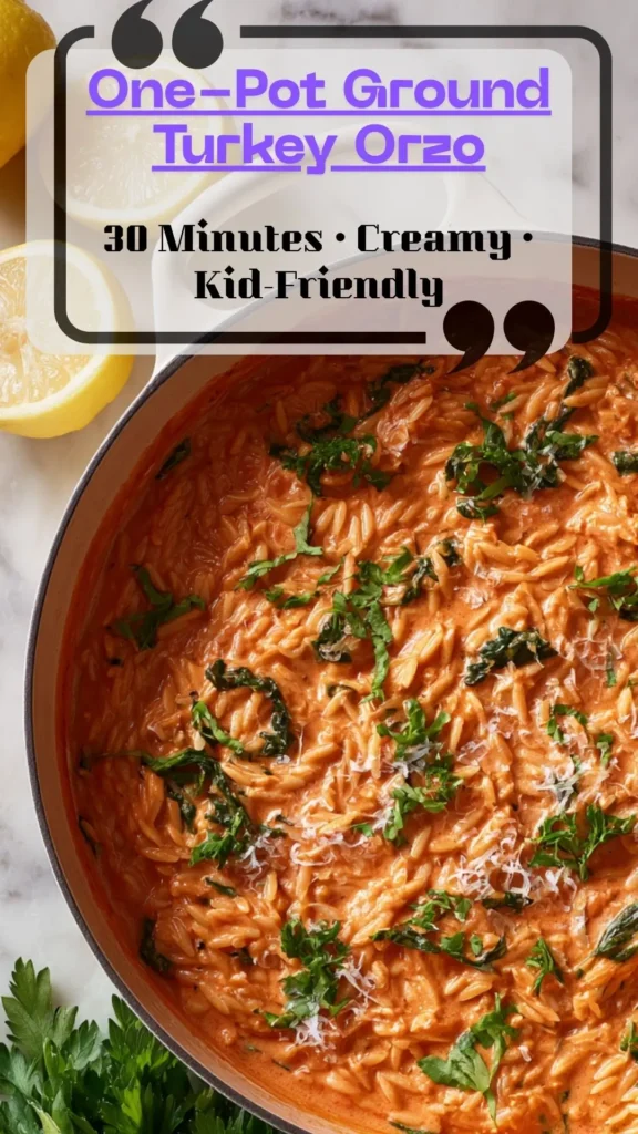 Skillet of creamy ground turkey orzo with spinach and Parmesan in tomato sauce; kid-friendly weeknight dinner, Dutch-oven option.