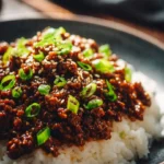 Delicious Korean Ground Beef Bowl topped with vegetables and sesame seeds