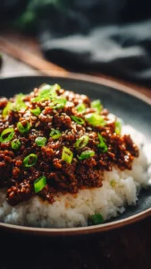 Delicious Korean Ground Beef Bowl topped with vegetables and sesame seeds