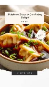 Bowl of savory potsticker soup with dumplings and fresh herbs