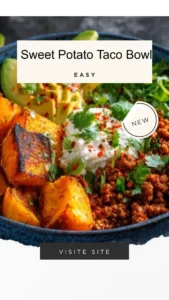 Colorful sweet potato taco bowl topped with fresh ingredients