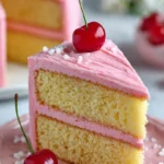 Delicious Almond Cake with Maraschino Cherry Buttercream Frosting on a plate