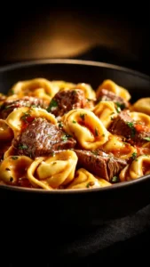 Delicious Garlic Steak Tortellini in Creamhouse Sauce Bliss on a plate.