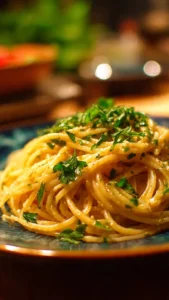 Delicious Garlic Parmesan Pasta served in a bowl garnished with fresh parsley and cheese.