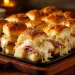 Delicious ham and cheese sliders served on a platter