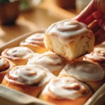 Freshly baked quick and easy cinnamon rolls topped with icing.