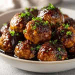 Slow cooker honey garlic meatballs seasoned with garlic and honey