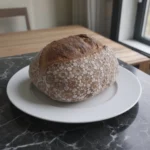 Lace Sourdough Bread with decorative wedding material flowers