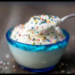 Whipped cottage cheese with birthday cake flavor served in a bowl