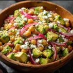 Chickpea Feta Avocado Salad with fresh ingredients in a bowl