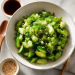 Smashed cucumber and snap pea salad with fresh vegetables