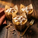 Delicious Christmas morning coffee cake muffins topped with cinnamon streusel.