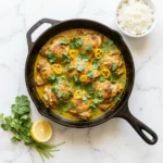 Plate of creamy Churu Yellow Chicken with vibrant spices reminiscent of Peru.