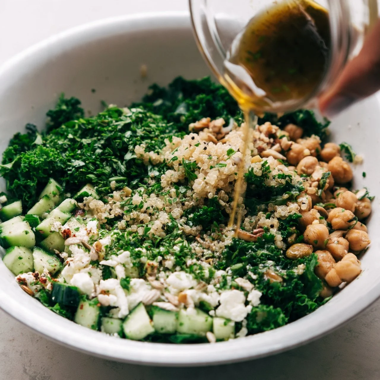 Kale Quinoa Salad with fresh ingredients and lemon dressing