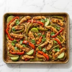 Sheet pan chili lime chicken fajitas with colorful vegetables