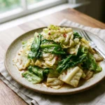Fresh Yamitsuki Cabbage displayed on a wooden cutting board