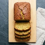 Delicious slice of gluten-free zucchini bread with nuts and chocolate chips