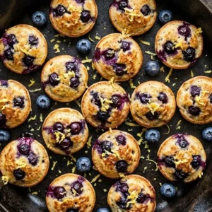 Lemon blueberry cottage cheese pancake bites served on a plate