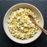 Healthy cottage cheese egg salad served in a bowl with fresh ingredients