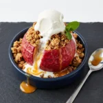 Delicious baked apples topped with a crispy oat mixture.
