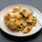 Delicious Chicken Bubble Biscuit Bake casserole topped with golden biscuits.
