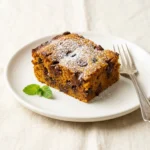 Delicious homemade pumpkin bars topped with rich chocolate frosting