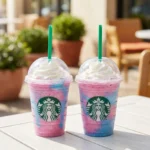 Colorful Unicorn Frappe topped with whipped cream and rainbow sprinkles